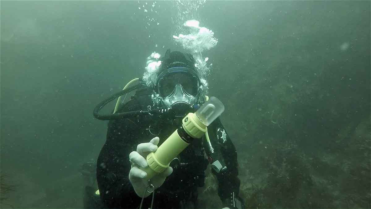Original Pathfinder Strobe pictured underwater with a diver